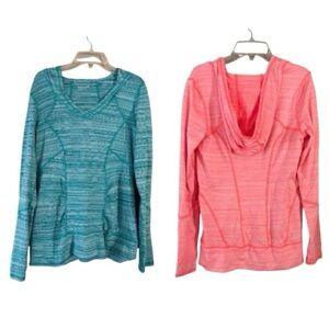 ZELLA bundle is 2 activewear hoodies, both size  Medium. Teal and Orange stripe